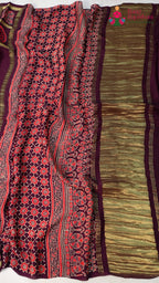 pallu detailing of wine modal banarasi zari weave gharchola saree