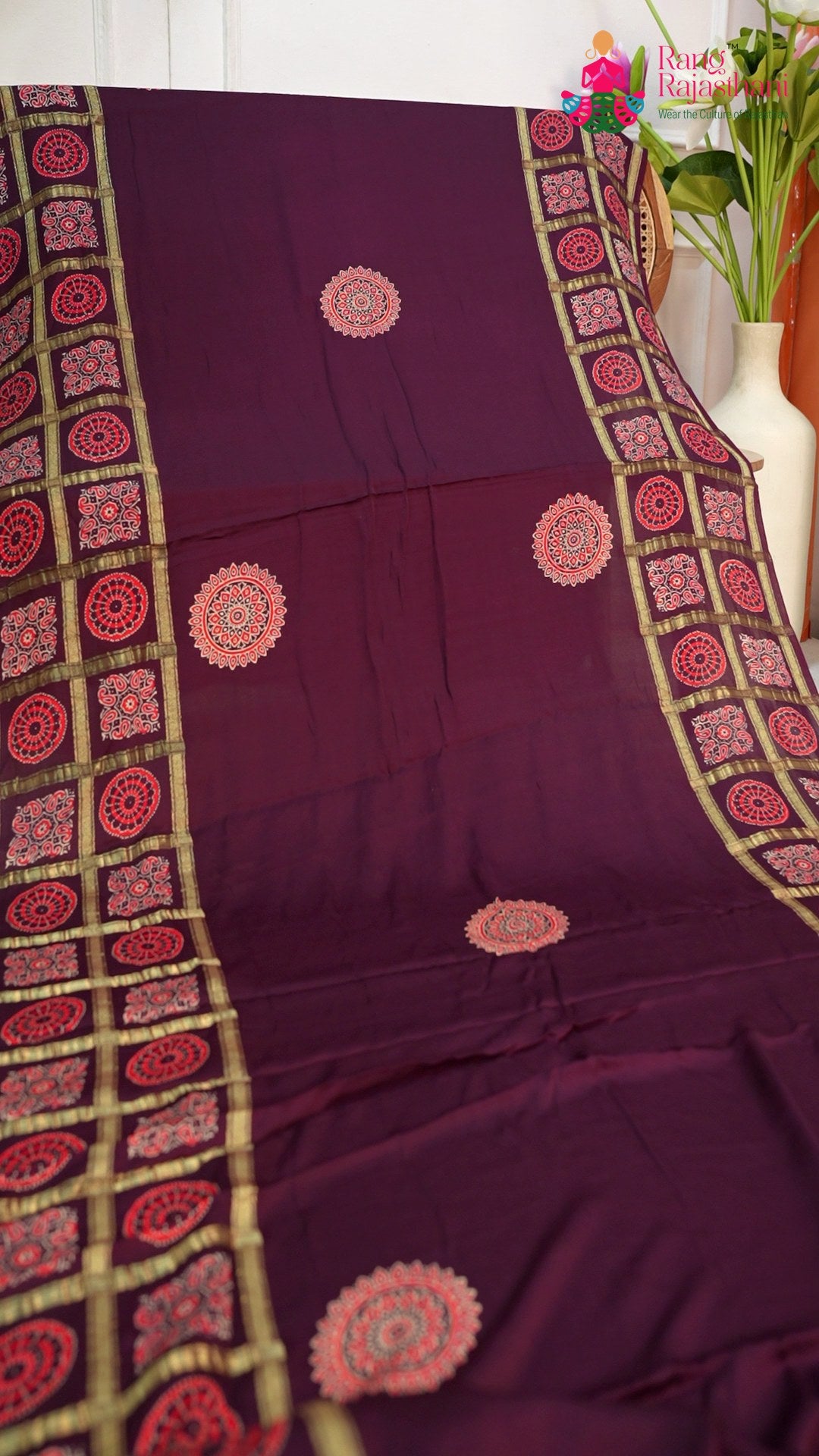 border detail of wine modal banarasi zari weave gharchola saree