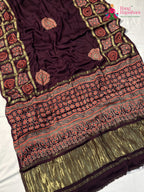 close up view of wine modal banarasi zari weave gharchola saree