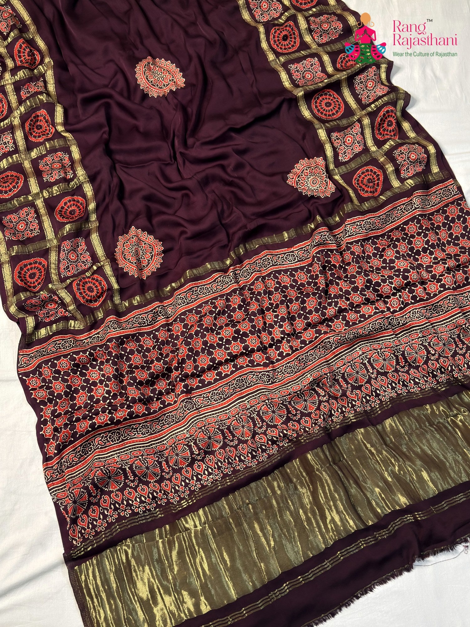 close up view of wine modal banarasi zari weave gharchola saree