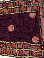intricate detail of wine modal banarasi zari weave gharchola saree
