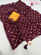 close up detailing of wine pure dola silk bandhani saree