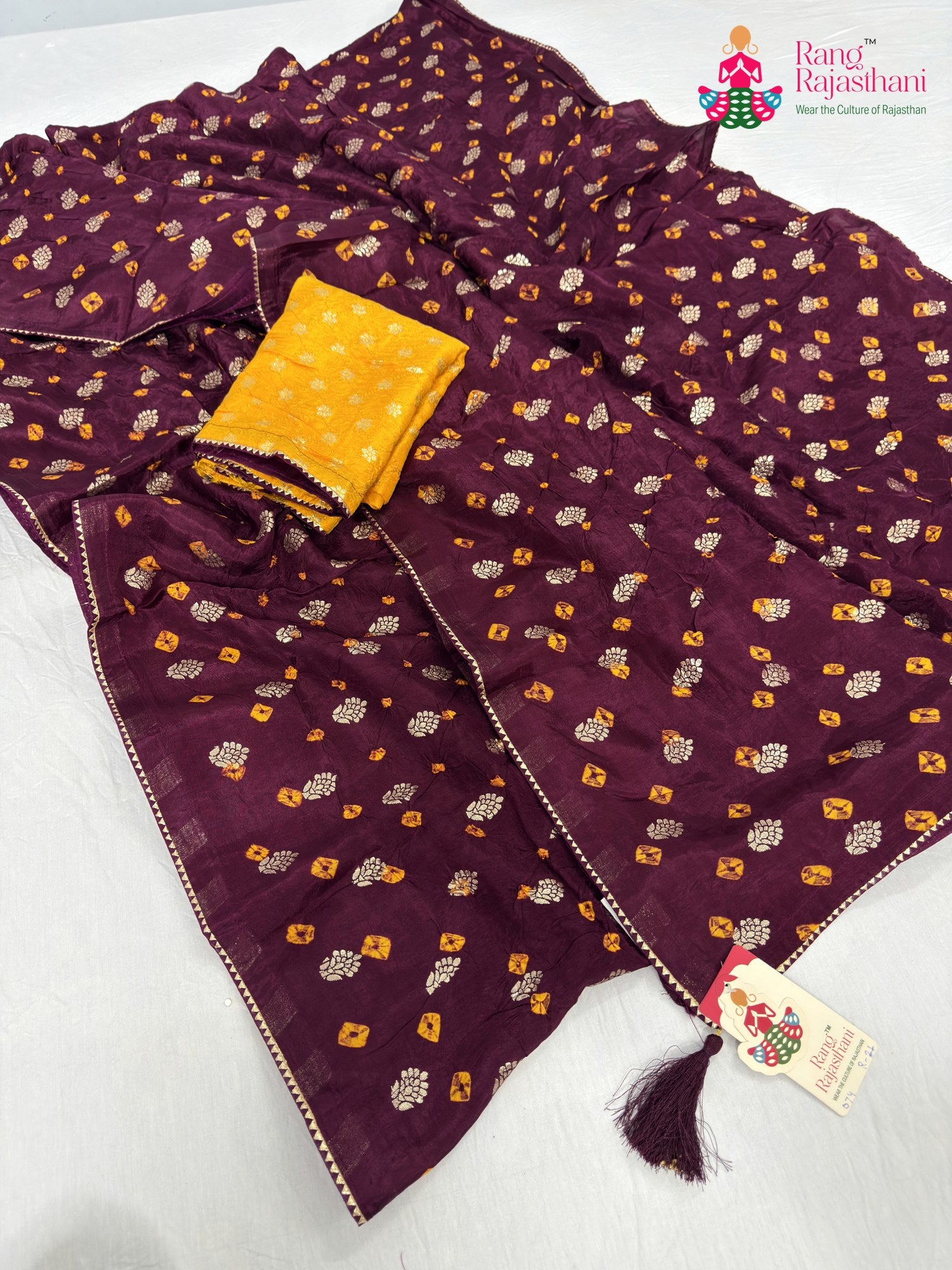 complete look of wine pure dola silk bandhani saree