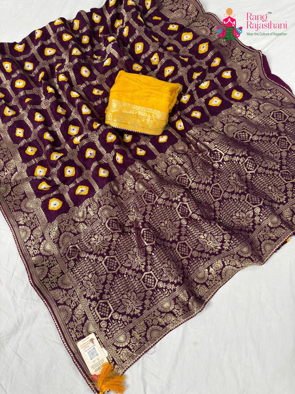 border detailing of wine pure dola silk bandhej banarasi zari saree