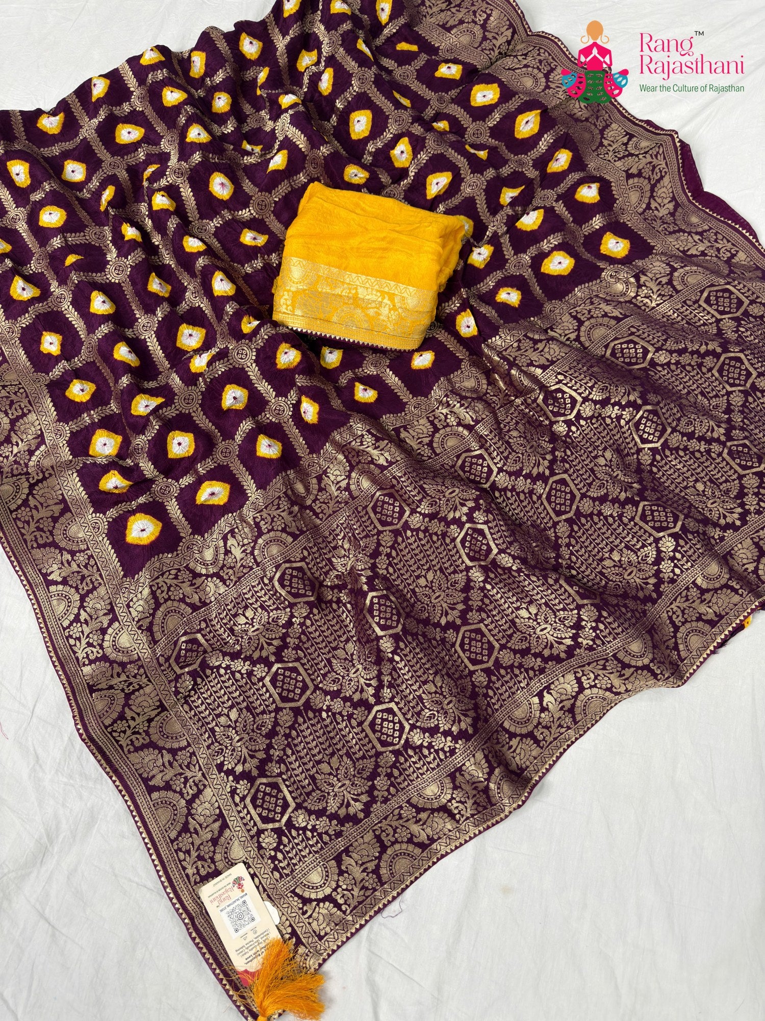 border detailing of wine pure dola silk bandhej banarasi zari saree