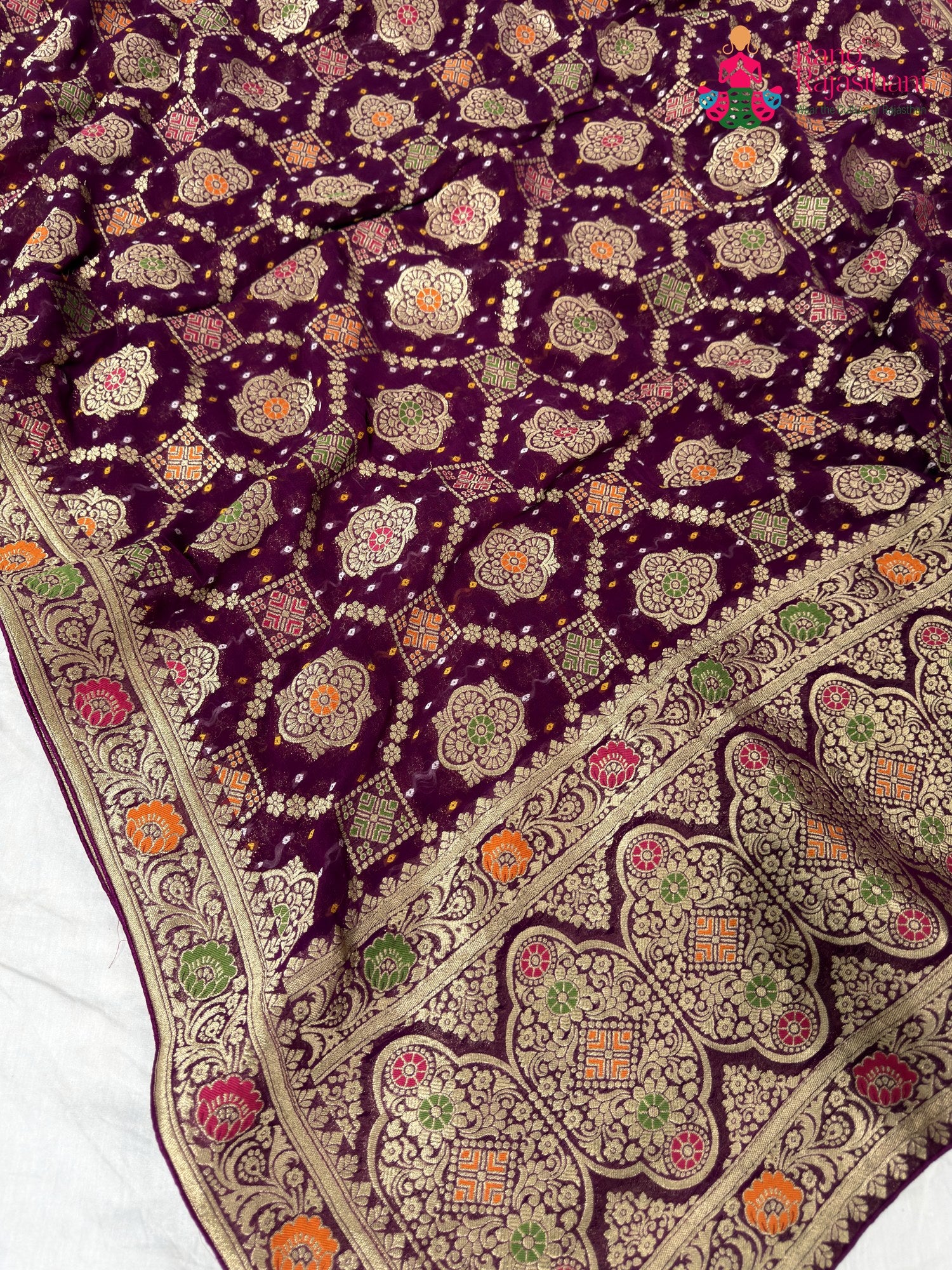 fabric texture of wine pure georgette khaddi saree