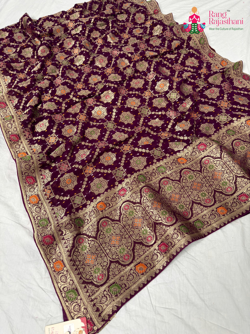 border detailing of wine pure georgette khaddi saree