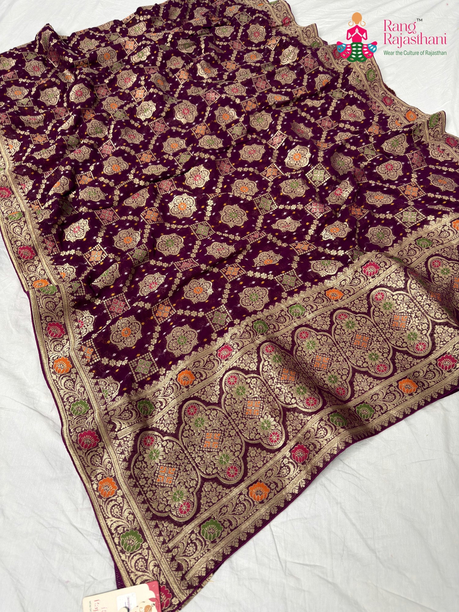 border detailing of wine pure georgette khaddi saree