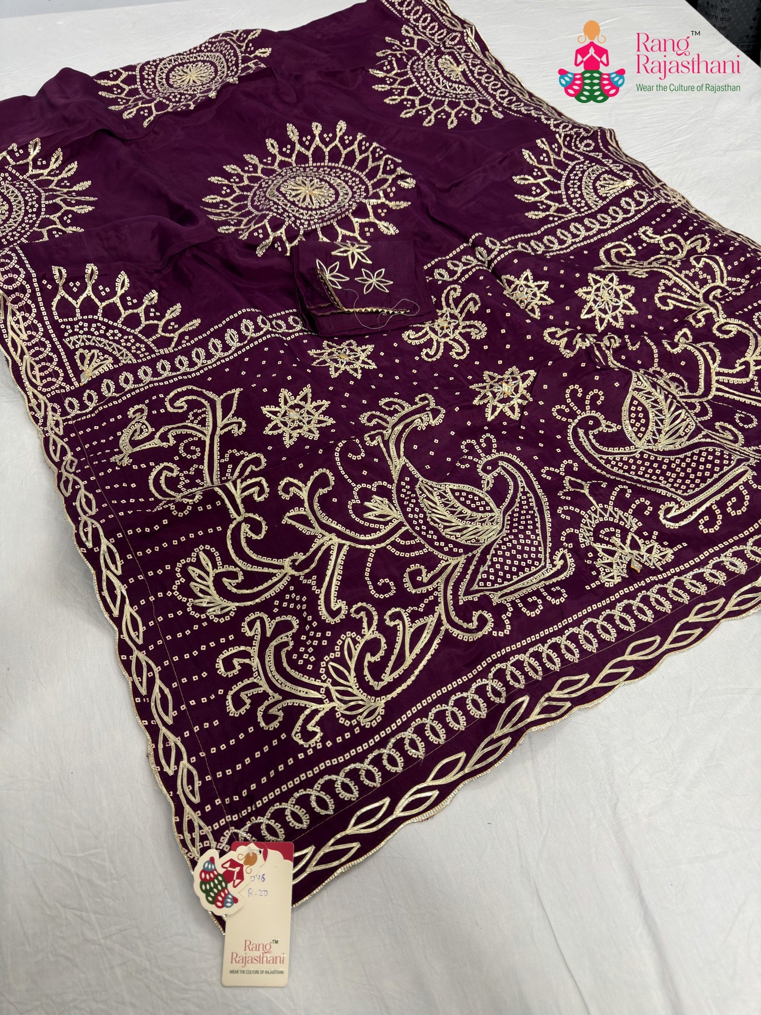 wine pure upada silk bandhani saree for wedding reception by Rang Rajasthani