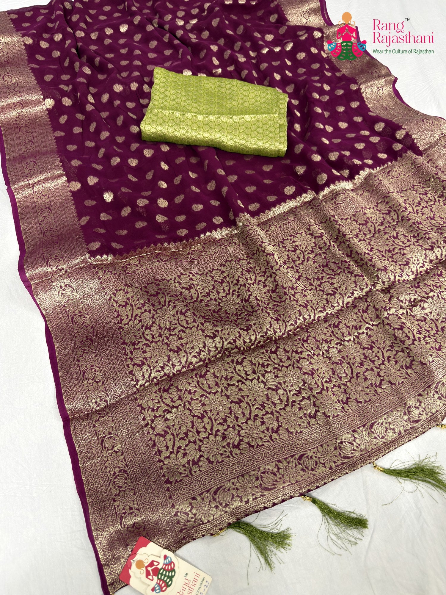 close up detailing of wine soft georgette banarasi zari weave saree