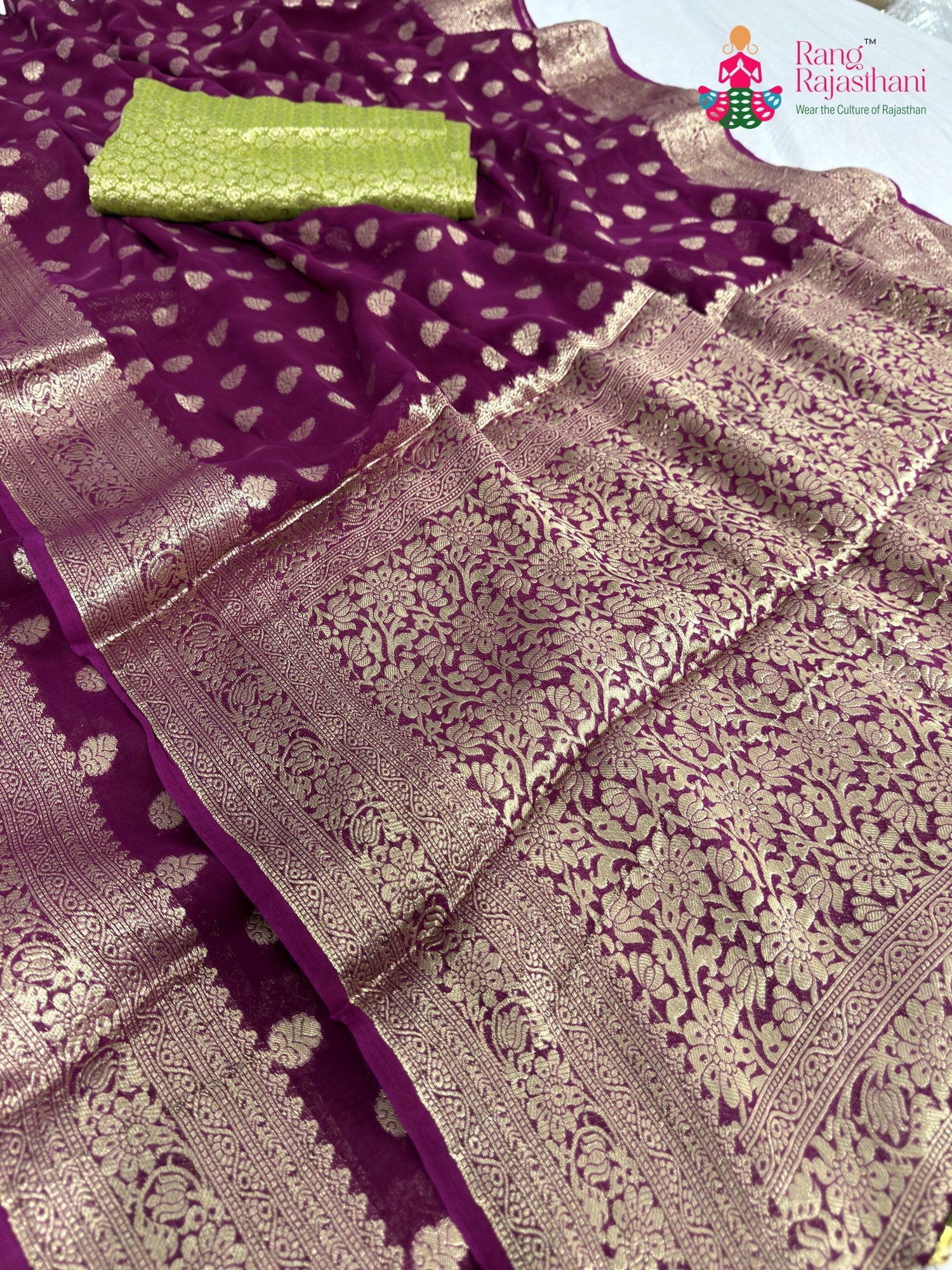 border detailing of wine soft georgette banarasi zari weave saree
