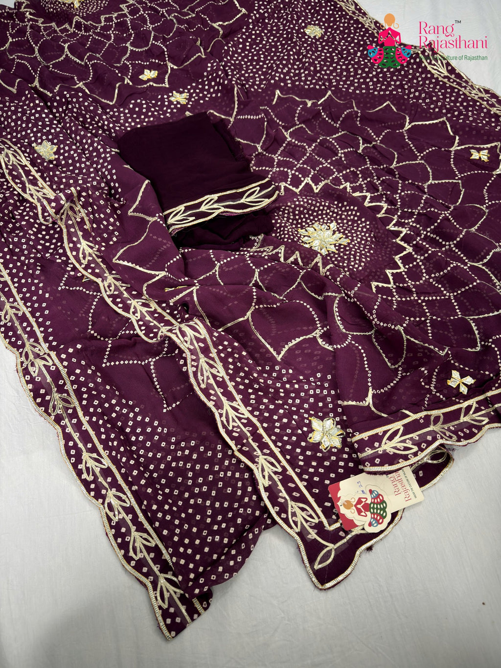 complete look of wine soft georgette bandhani saree