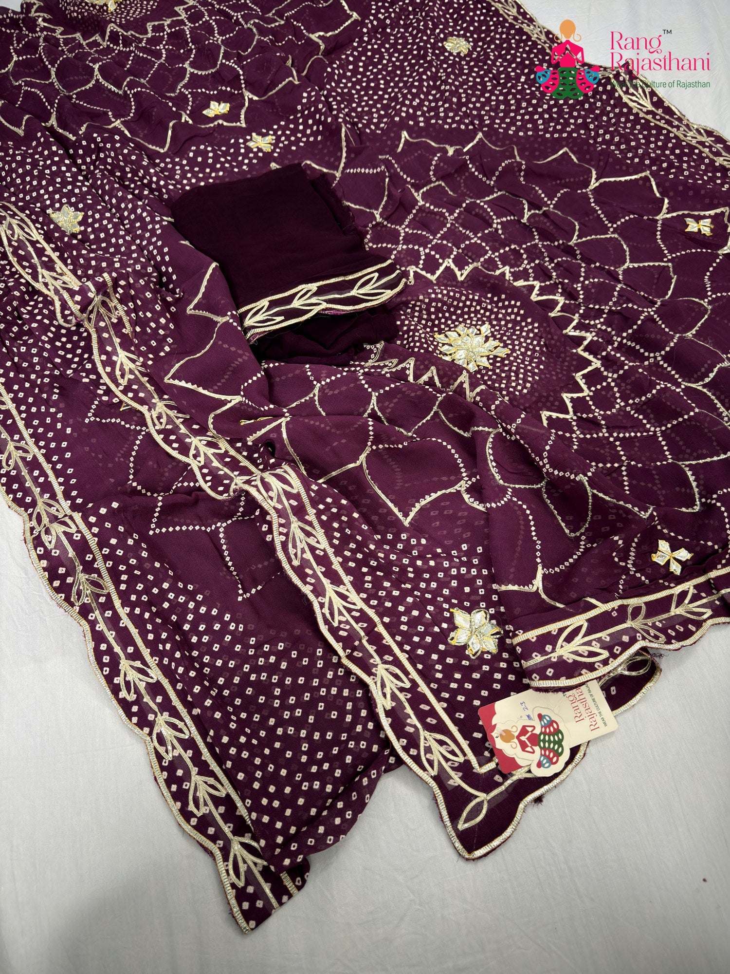 complete look of wine soft georgette bandhani saree