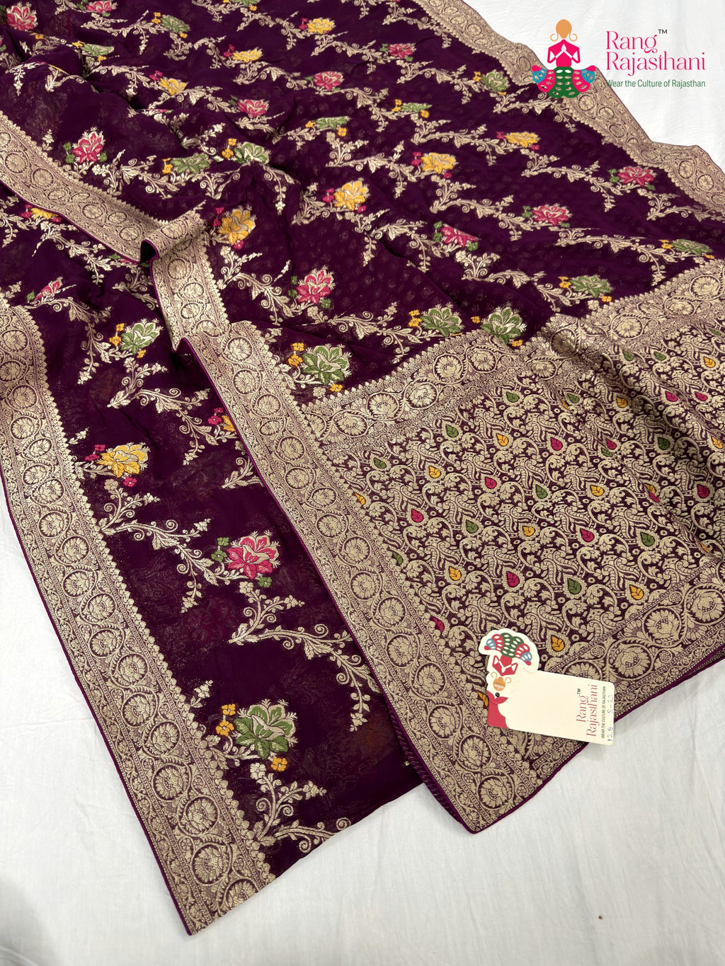 border detailing of wine soft georgette meenakari zari saree