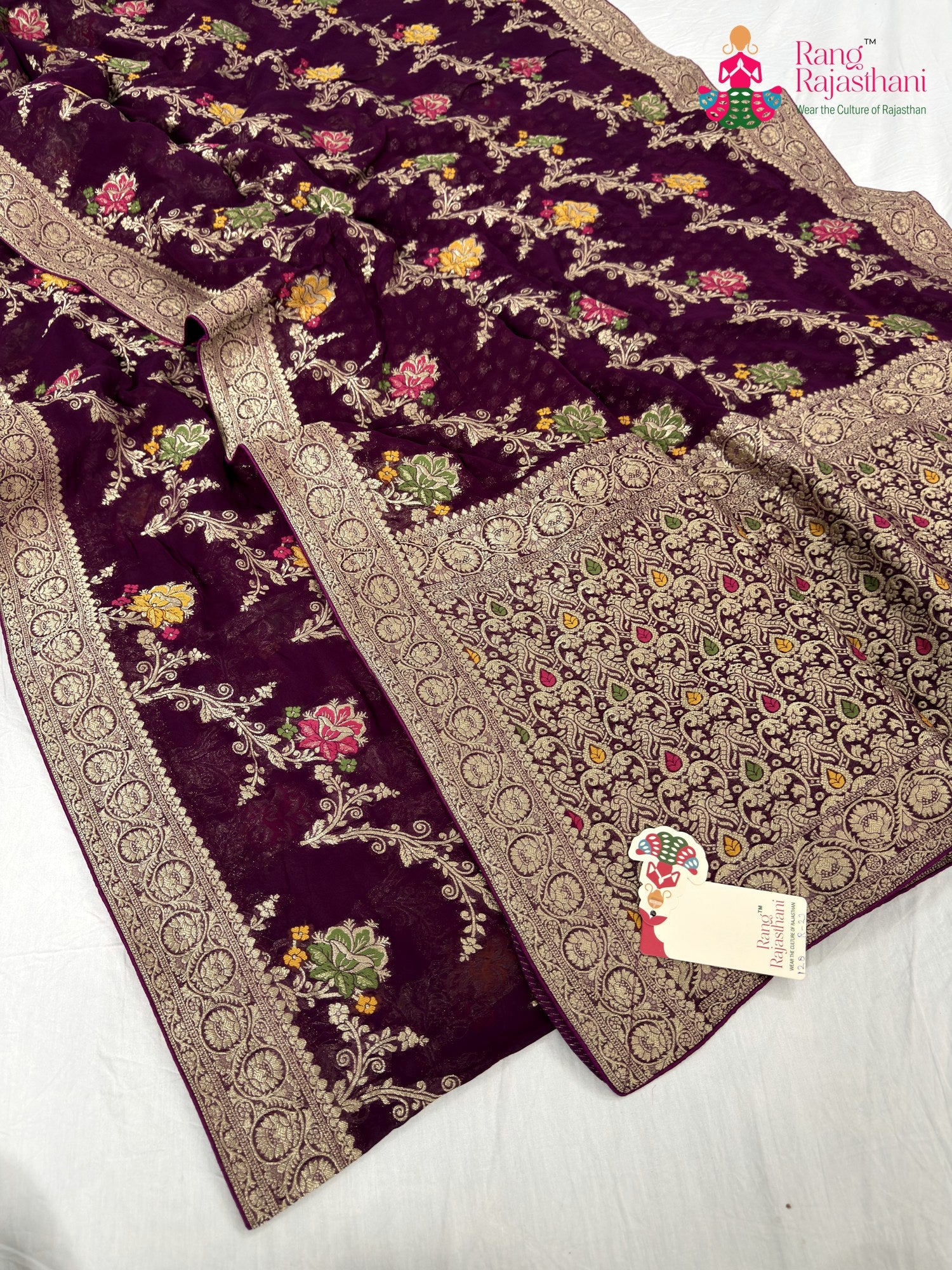 border detailing of wine soft georgette meenakari zari saree