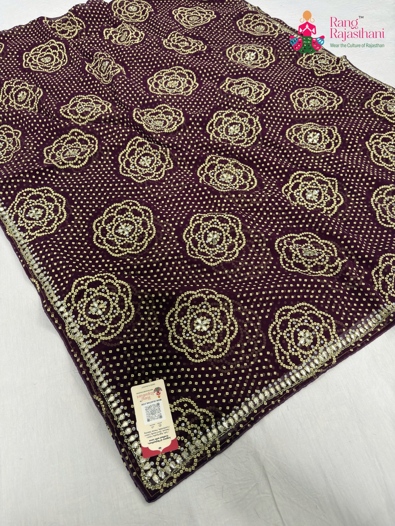 pallu detailing of wine synthetic bandhani saree