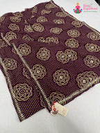 close up detailing of wine synthetic bandhani saree