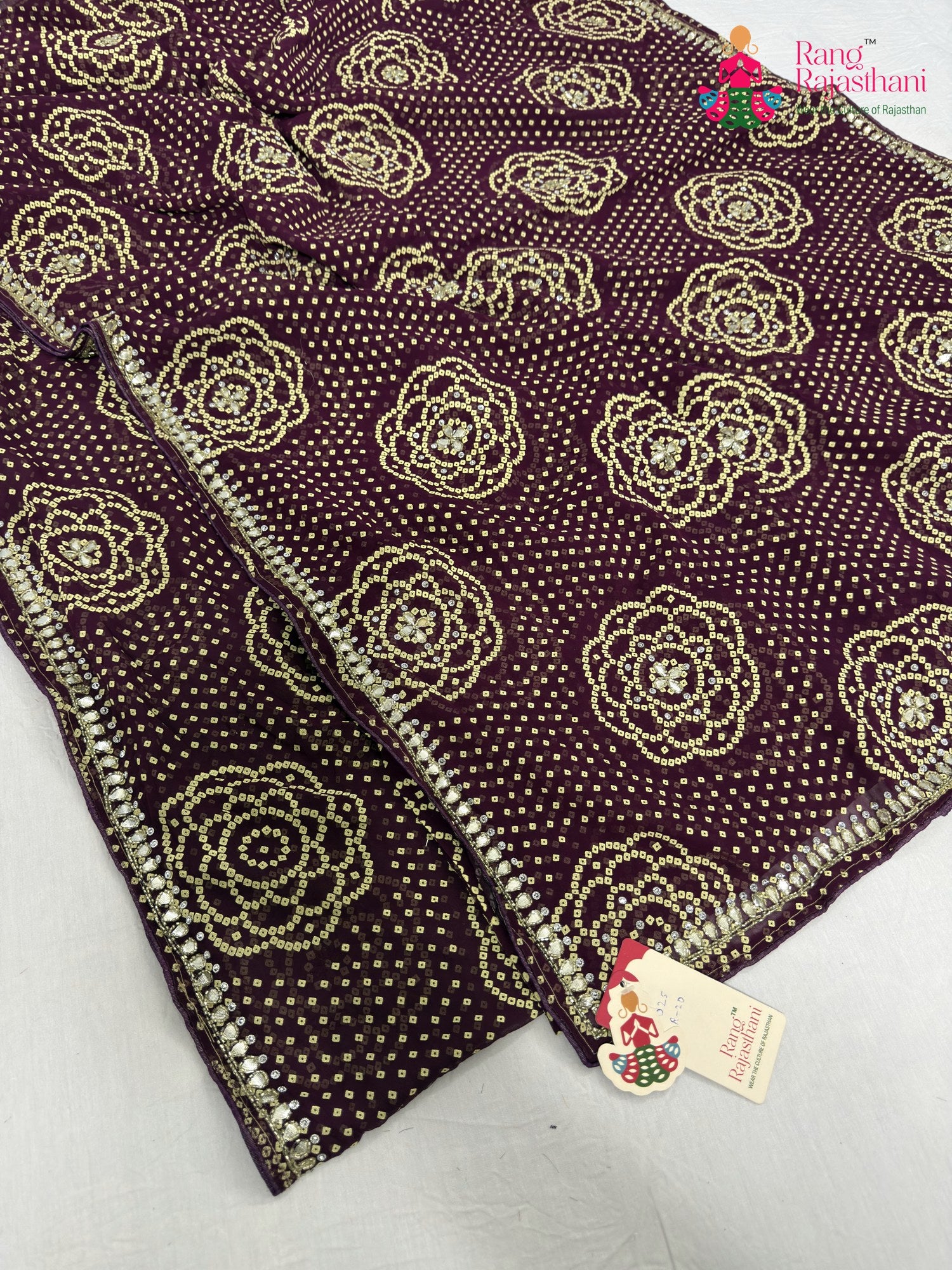 complete look of wine synthetic bandhani saree