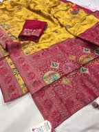 close up detailing of yellow art silk meenakari zari saree 