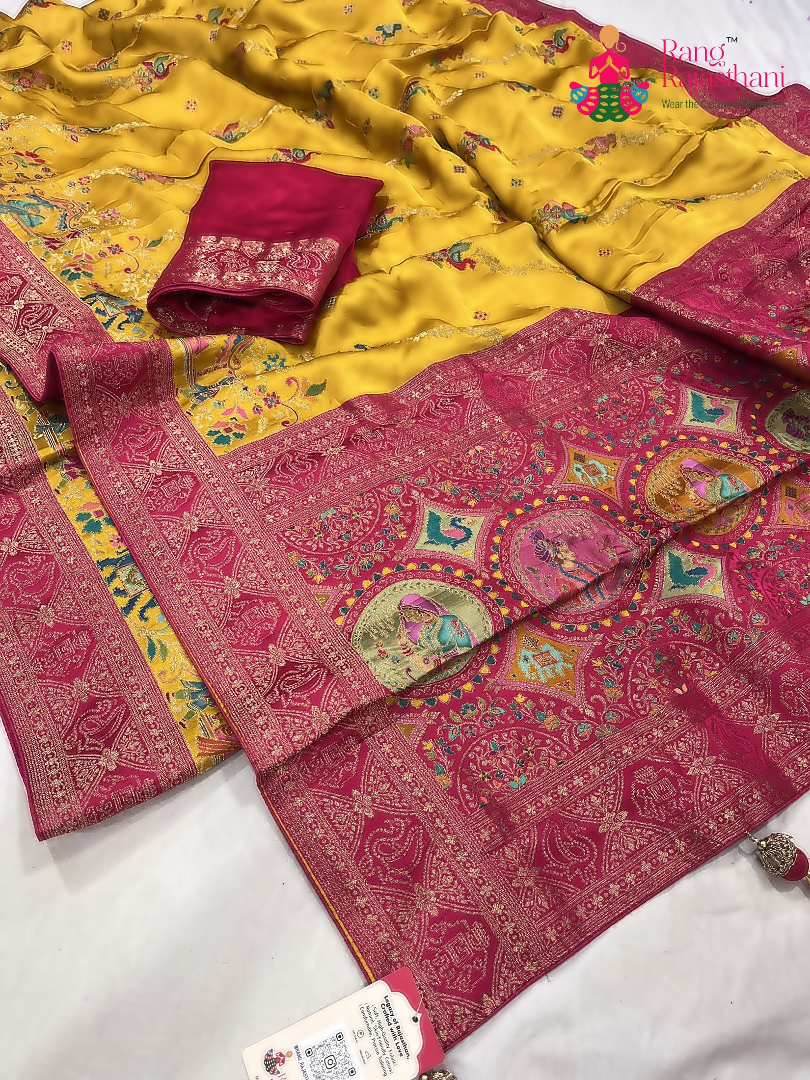 close up detailing of yellow art silk meenakari zari saree 