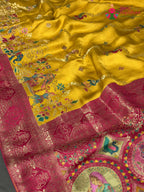 design pattern of yellow art silk meenakari zari saree