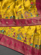 close up view of yellow art silk meenakari zari saree