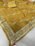 pallu detailing of yellow chiffon gota patti saree