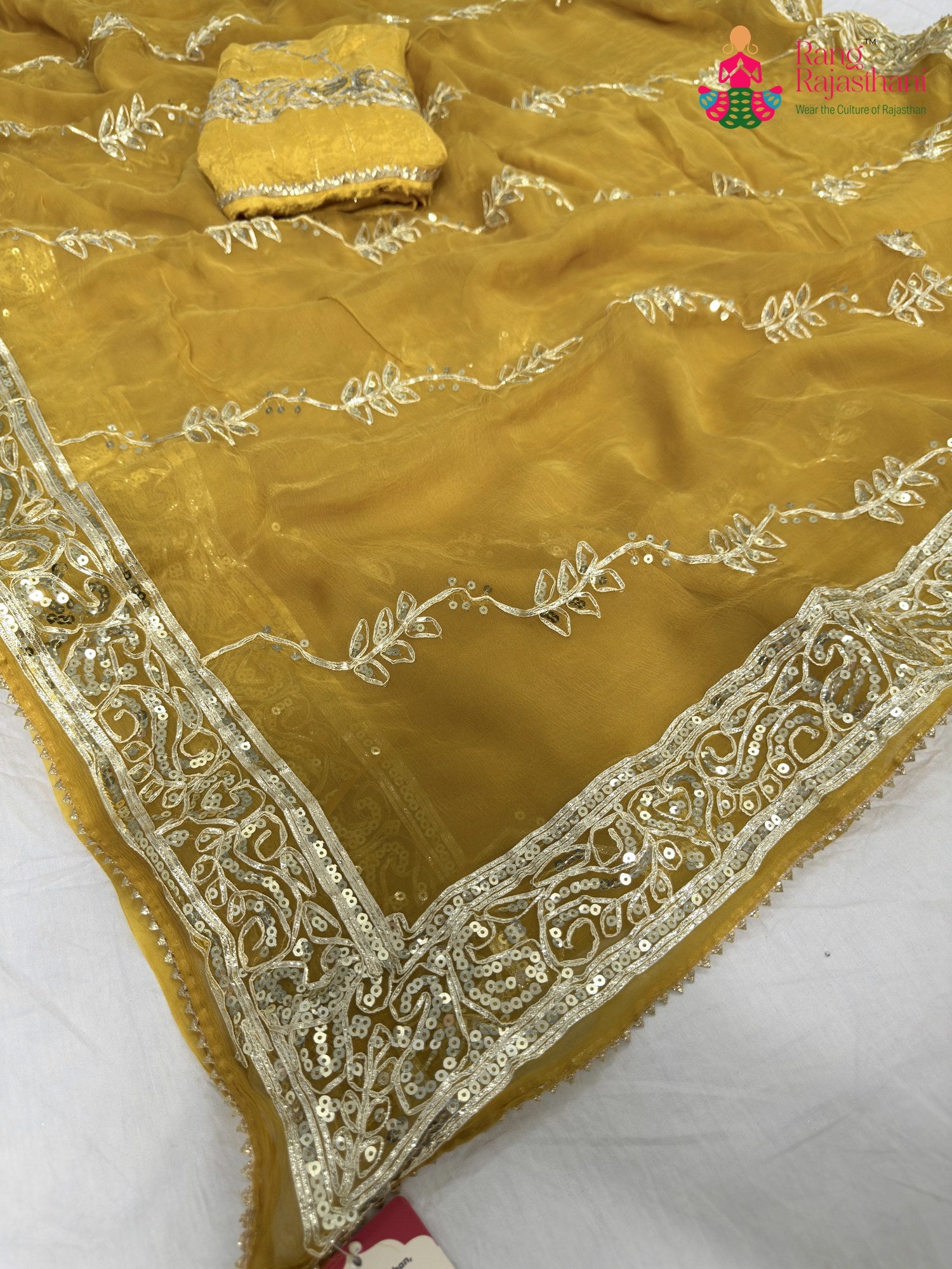pallu detailing of yellow chiffon gota patti saree