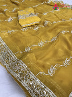 close up detailing of yellow chiffon gota patti saree