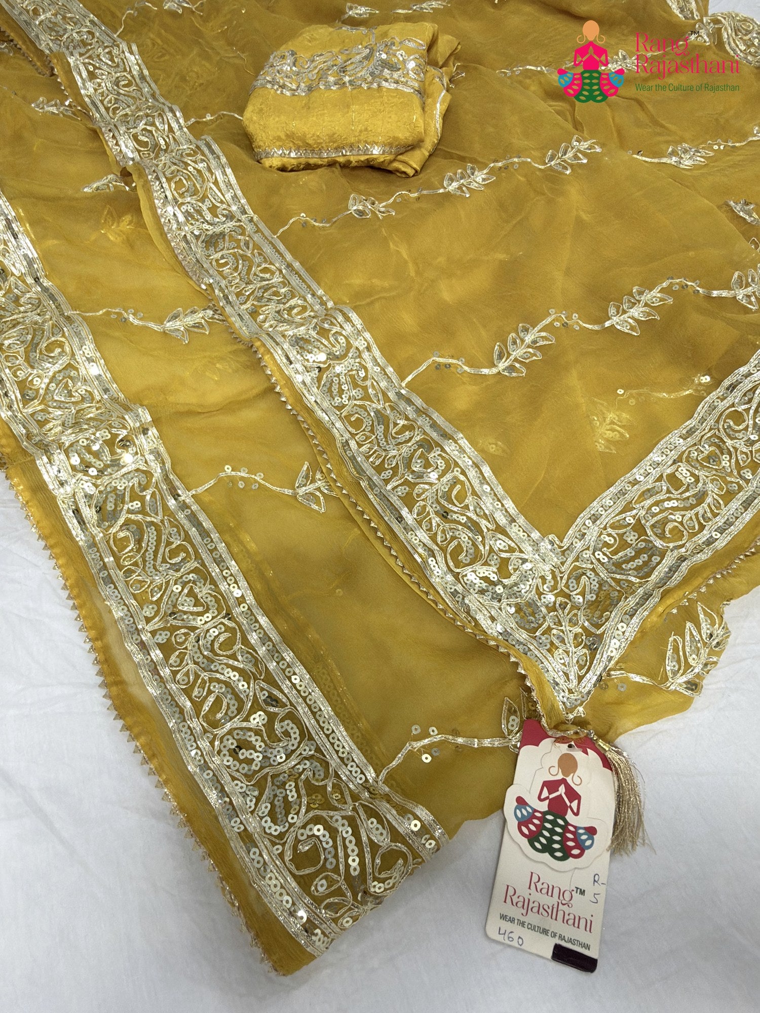 border detailing of yellow chiffon gota patti saree