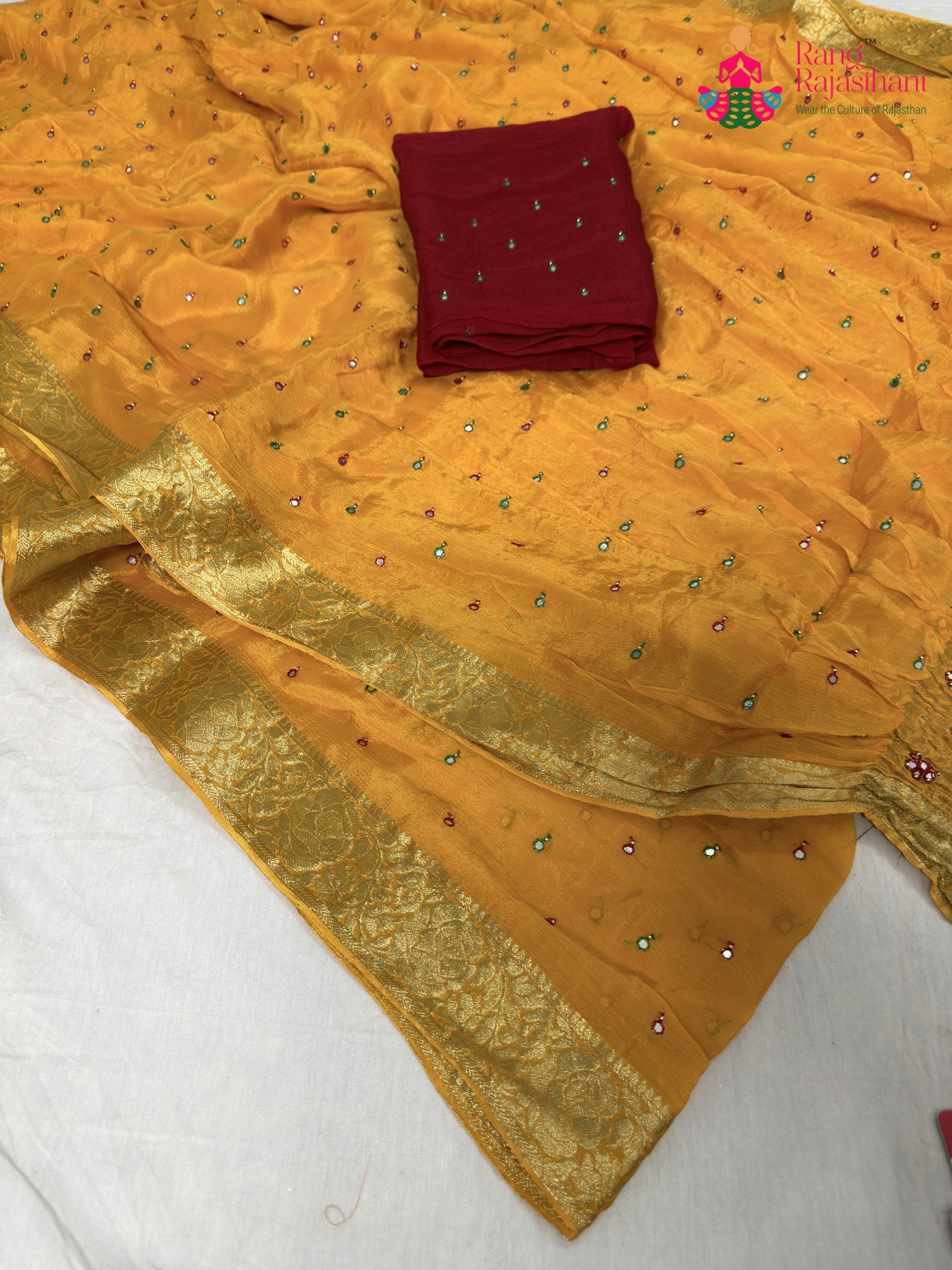 border detailing of yellow chinnon banarasi zari weave saree