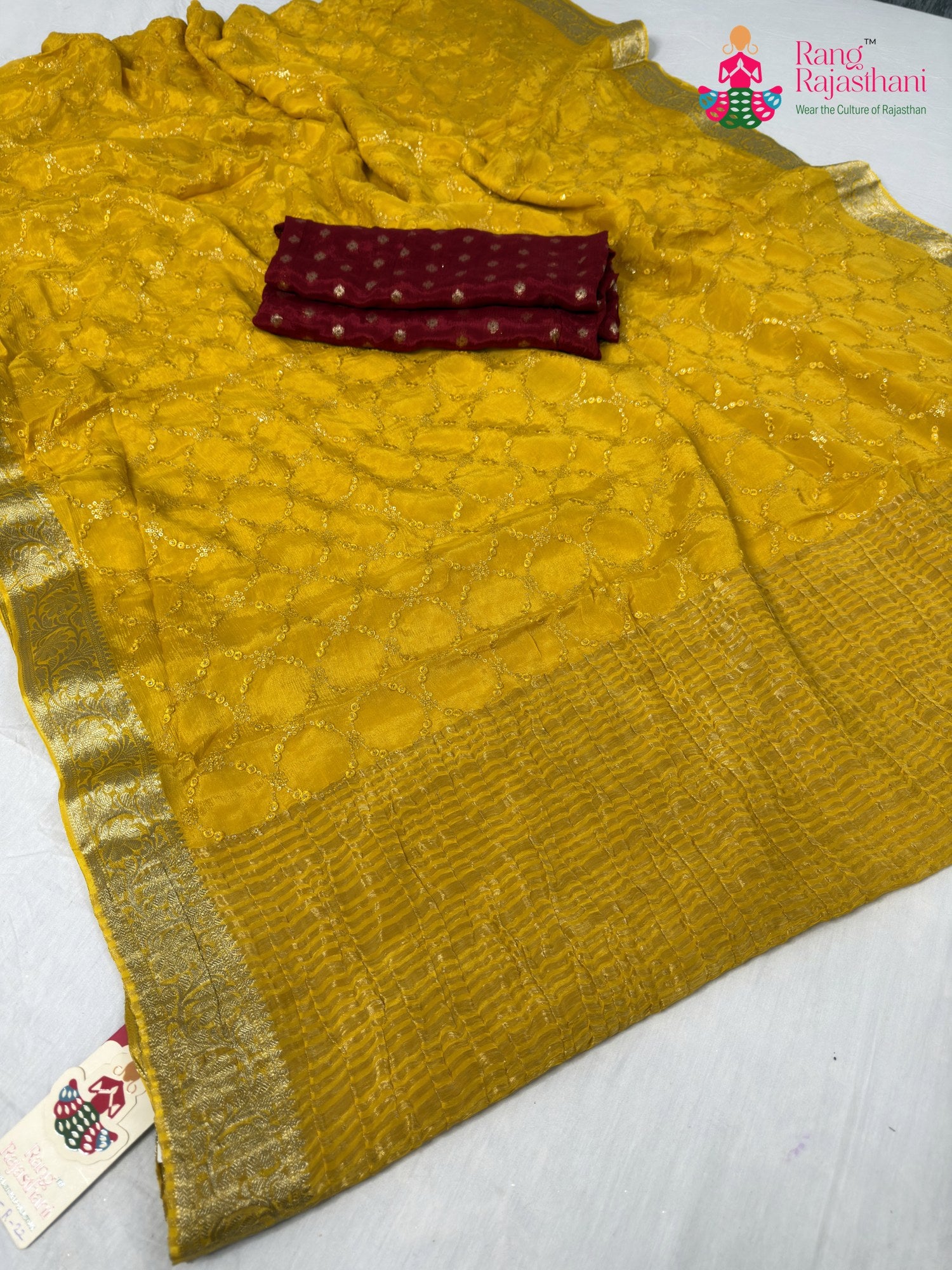 pallu detailing of yellow chinnon sequin saree