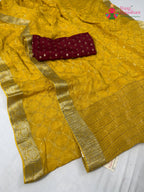 close up detailing of yellow chinnon sequin saree