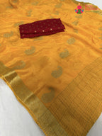 close up detailing of yellow chinnon zari embroidery saree