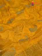 design pattern of yellow chinnon zari embroidery saree