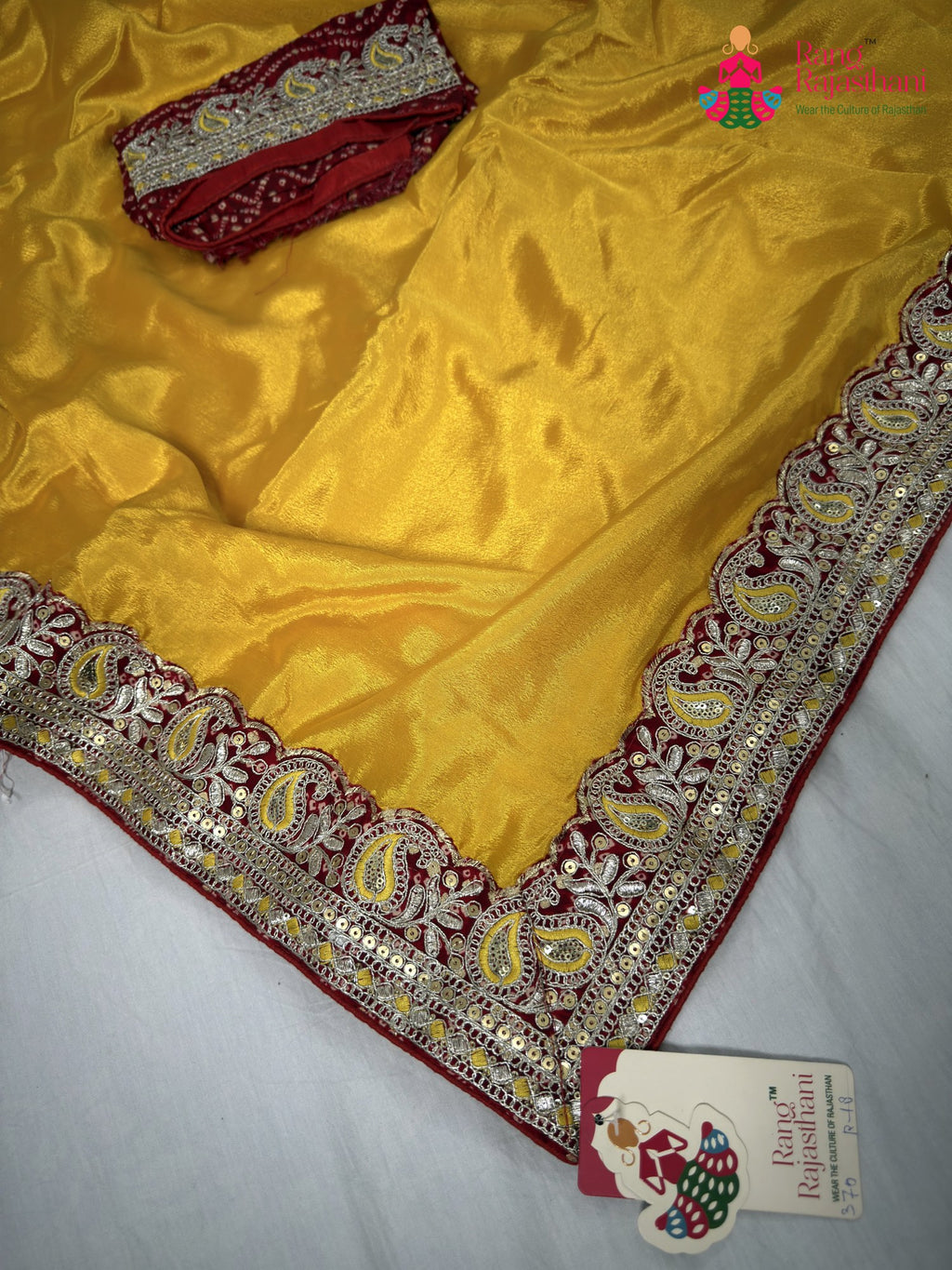 full view of yellow fabric saree