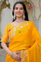 Yellow Imported Fendi saree with Pita Work close up detailing