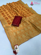 yellow pure dola silk bandhani saree for motherhood ceremony by Rang Rajasthani