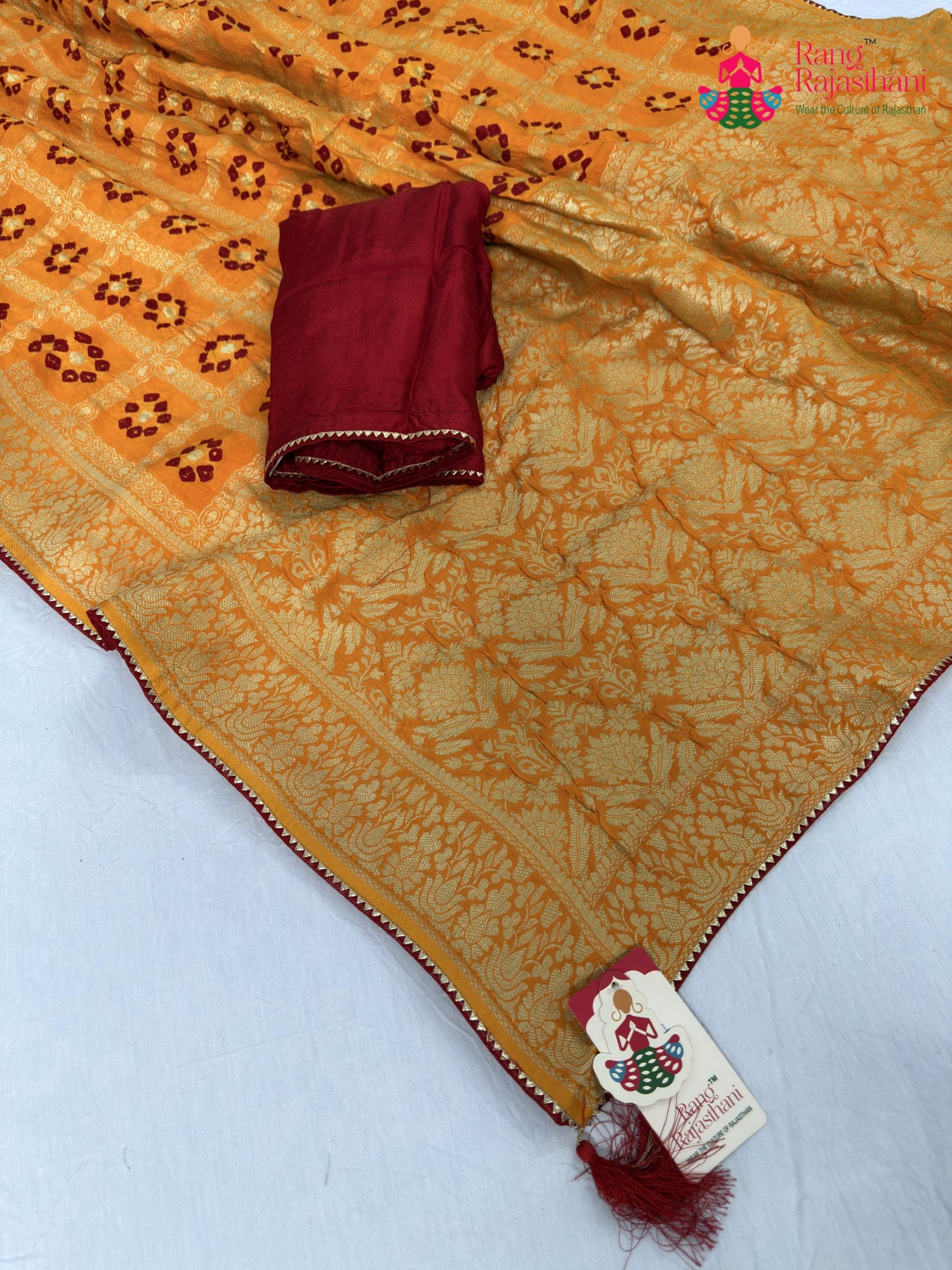 pallu detailing of yellow pure dola silk bandhani saree