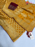 complete look of yellow pure dola silk bandhani saree
