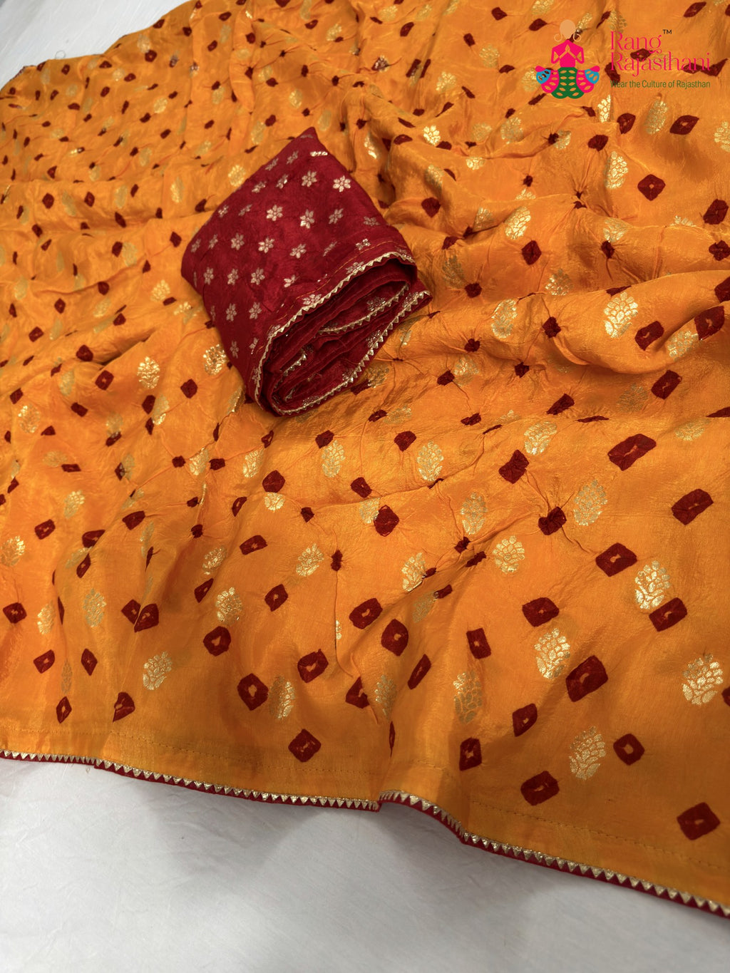 border detailing of yellow pure dola silk bandhani saree