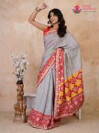 intricate detail of yellow pure russian silk gota patti saree