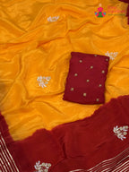 border detail of yellow russian silk hand embellishment pila saree