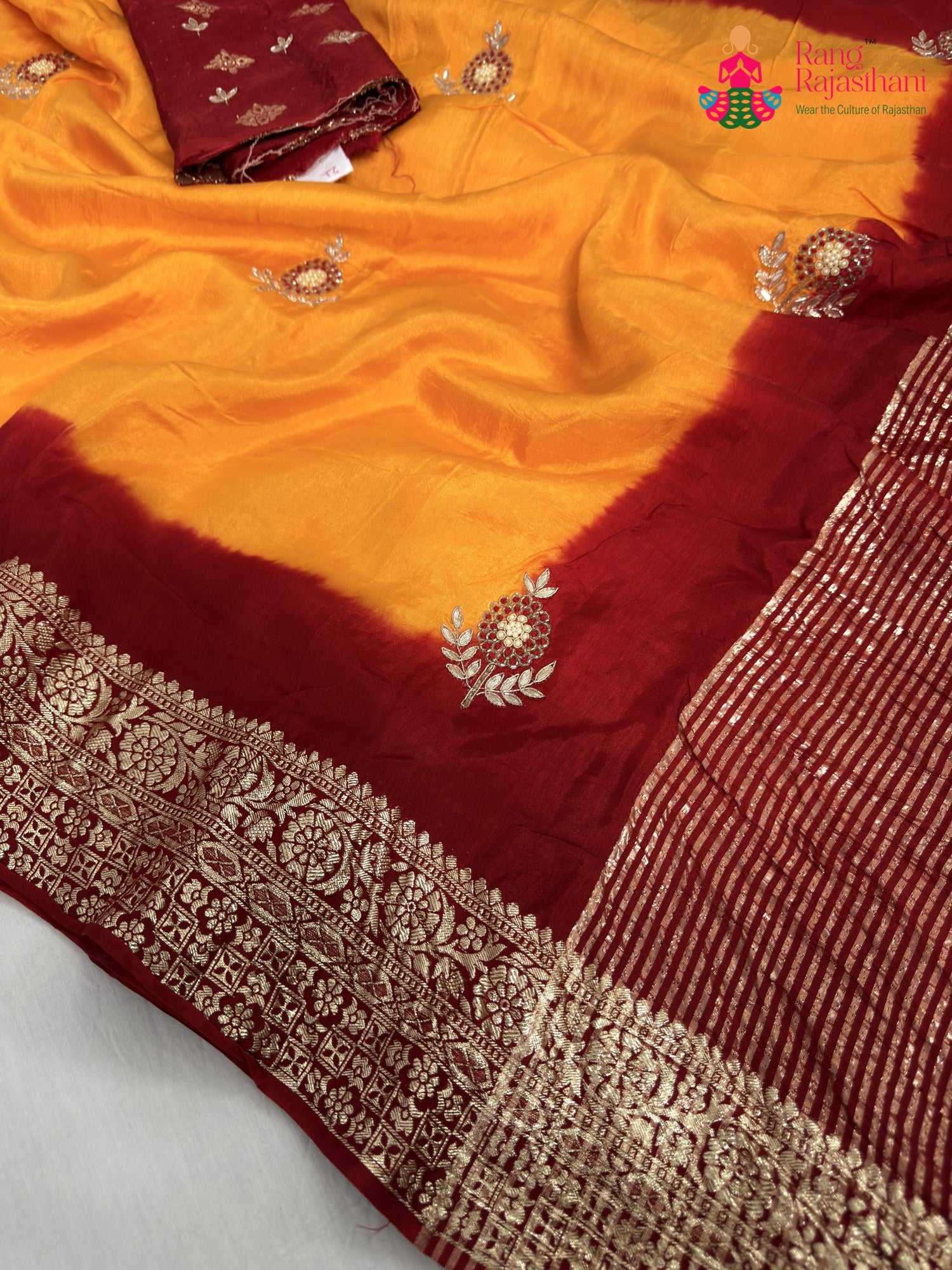 close up detailing of yellow pure russian silk hand embellishment saree