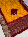 border detail of yellow pure russian silk hand embellishment saree