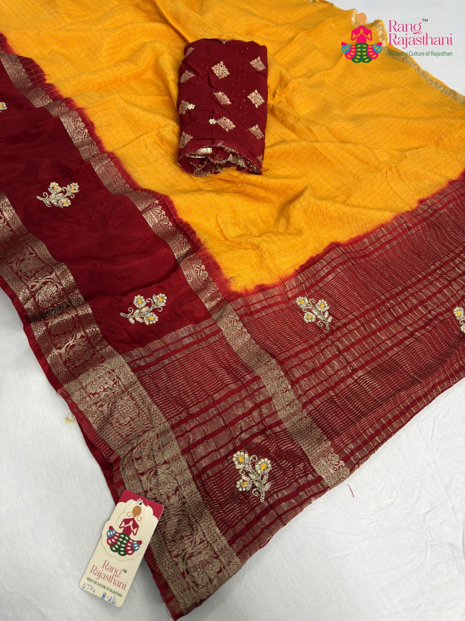close up detailing of yellow pure russian silk hand embellishment saree