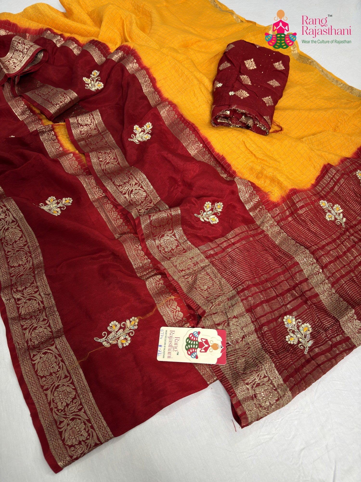 border detailing of yellow pure russian silk hand embellishment saree