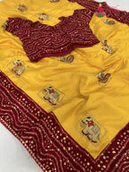 fabric texture of yellow red silk saree