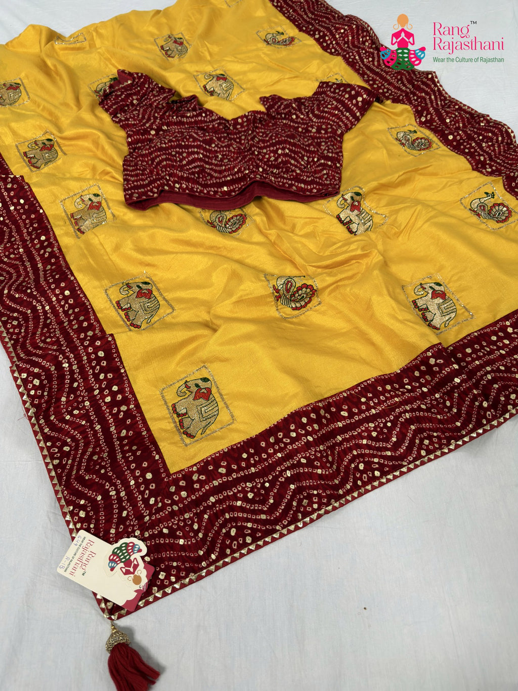 border detailing of yellow red silk saree