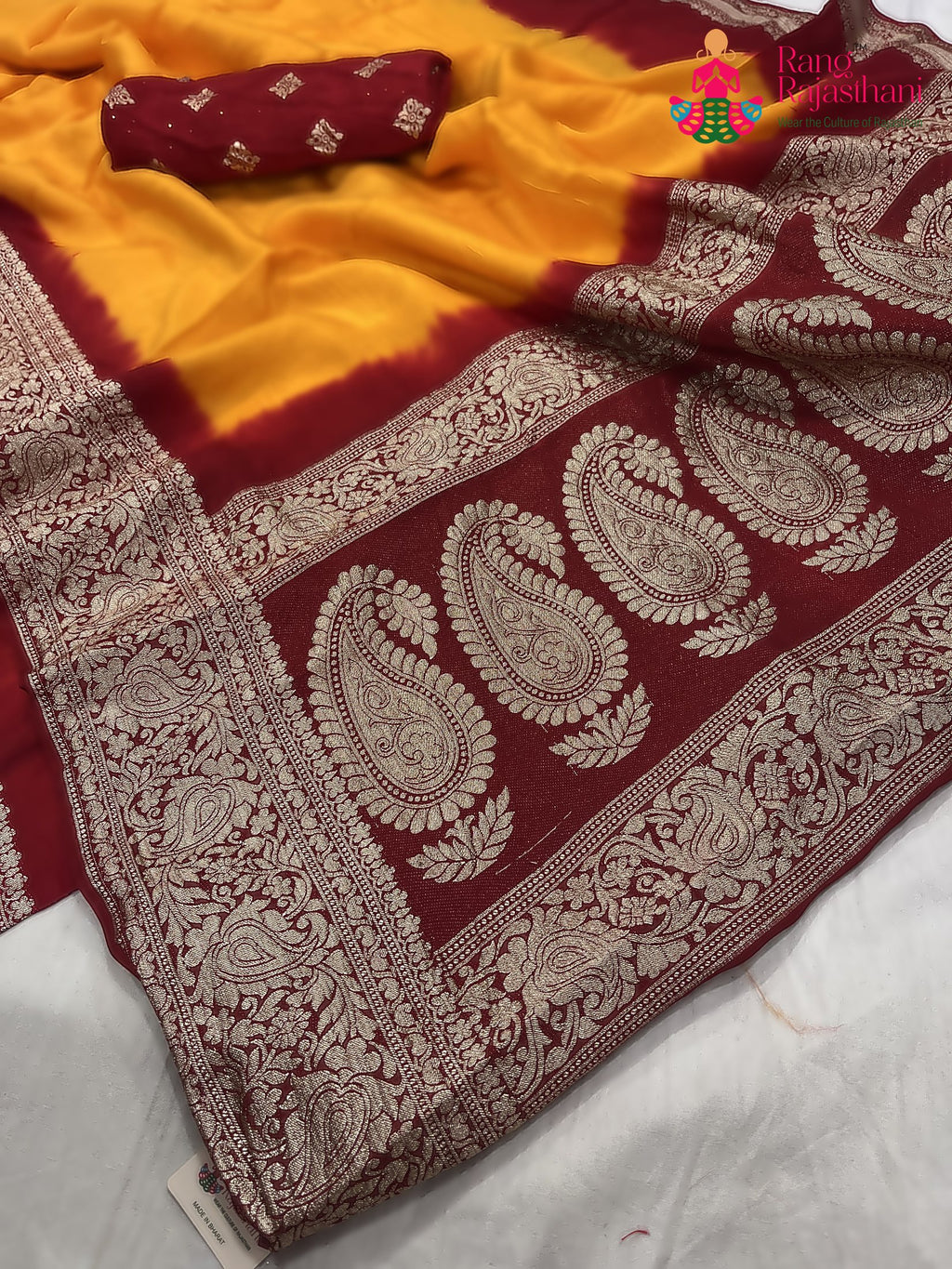 close up detailing of yellow russian silk banarasi zari weave pila saree 